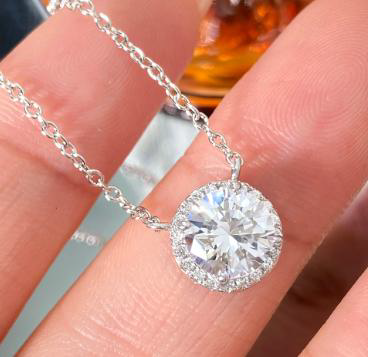Sterling Silver Halo Pendant with Brilliant Round Center Stone & CZ