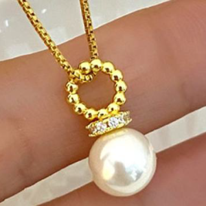 Enhance Y Style with a Radiant Pearl and Cubic Zirconia Gold